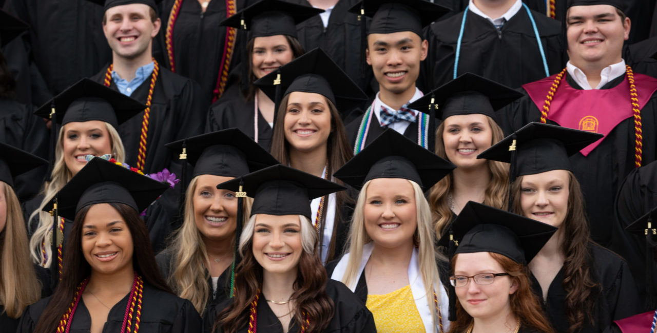 Students Pose For A Commencement Photo.