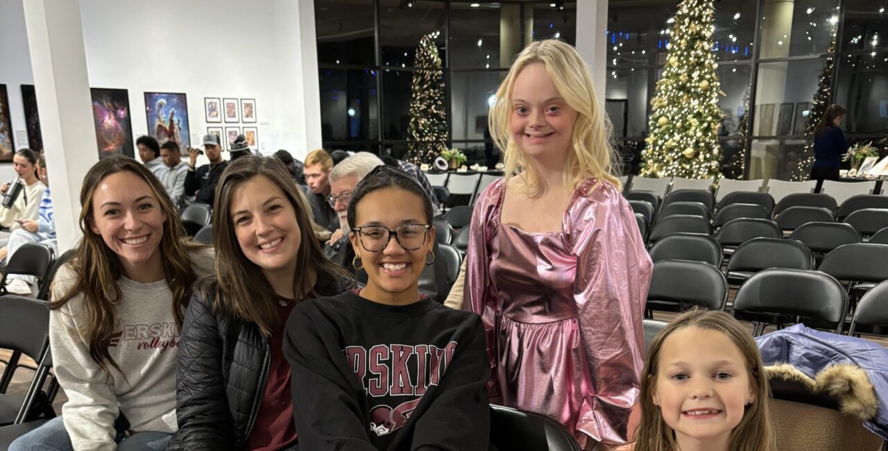 Lily Moore Poses With Erskine Students