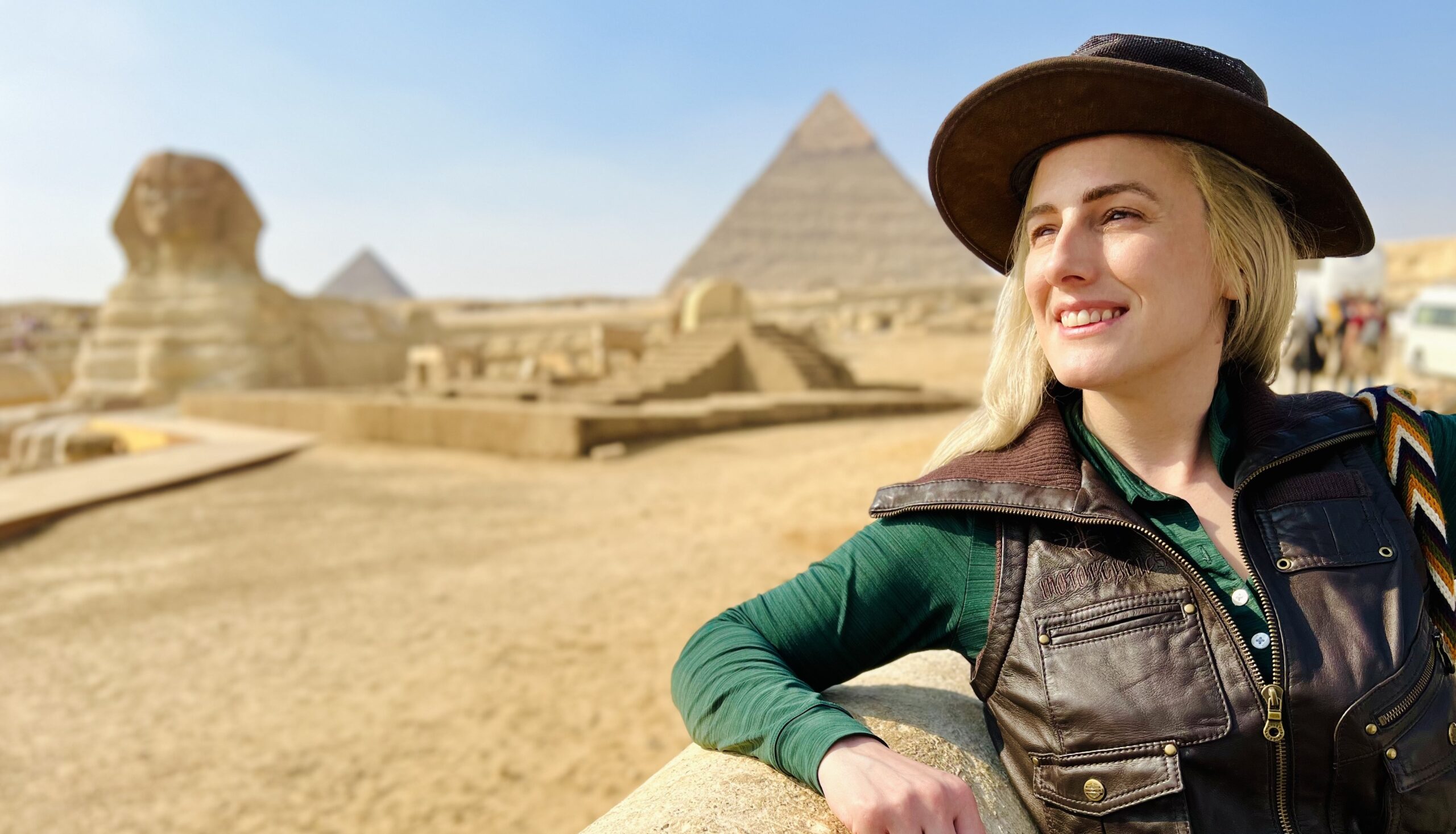 Dr. Christiane-Marie Abu Sarah poses in Egypt near the pyramids