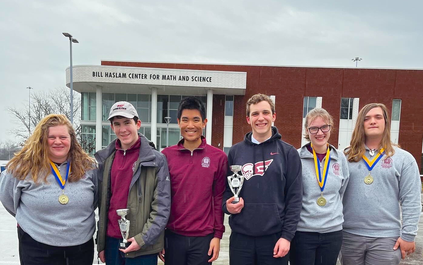 Members of the debate team pose with their awards. From left: Annie Bruner, Carson Bleich, Noah Lin, Caleb Roberts, Ellie Jordan, and Jackson Parris.