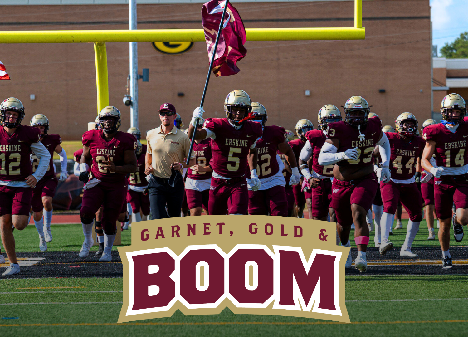 Barnet, Gold & Boom logo and Erskine Football players running onto the field