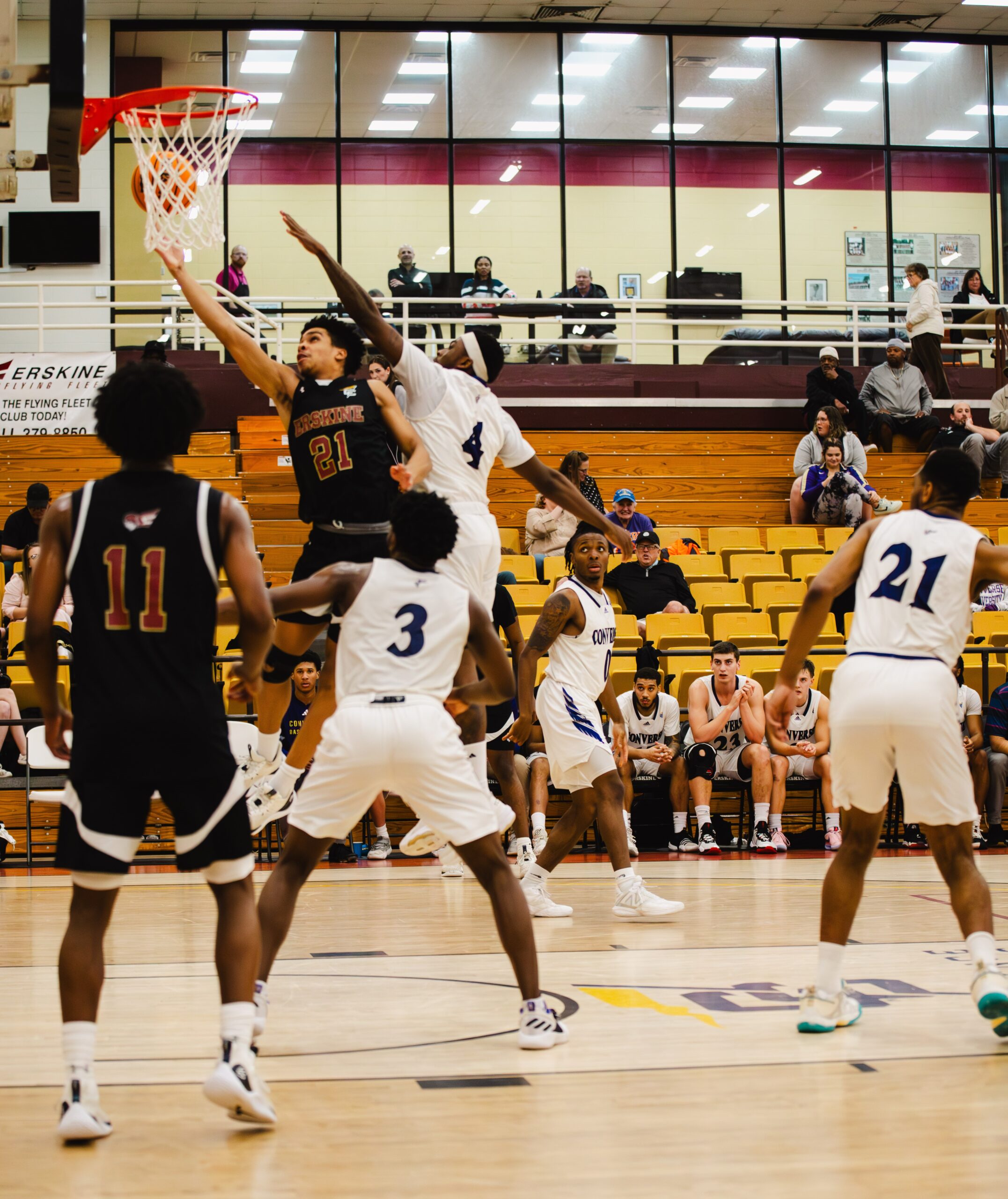 Men's basketball player makes a shot