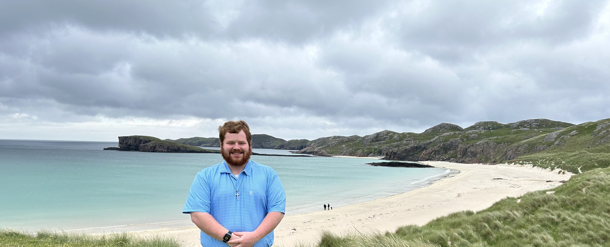 Gabriel Collier poses at a beach in Scotland.
