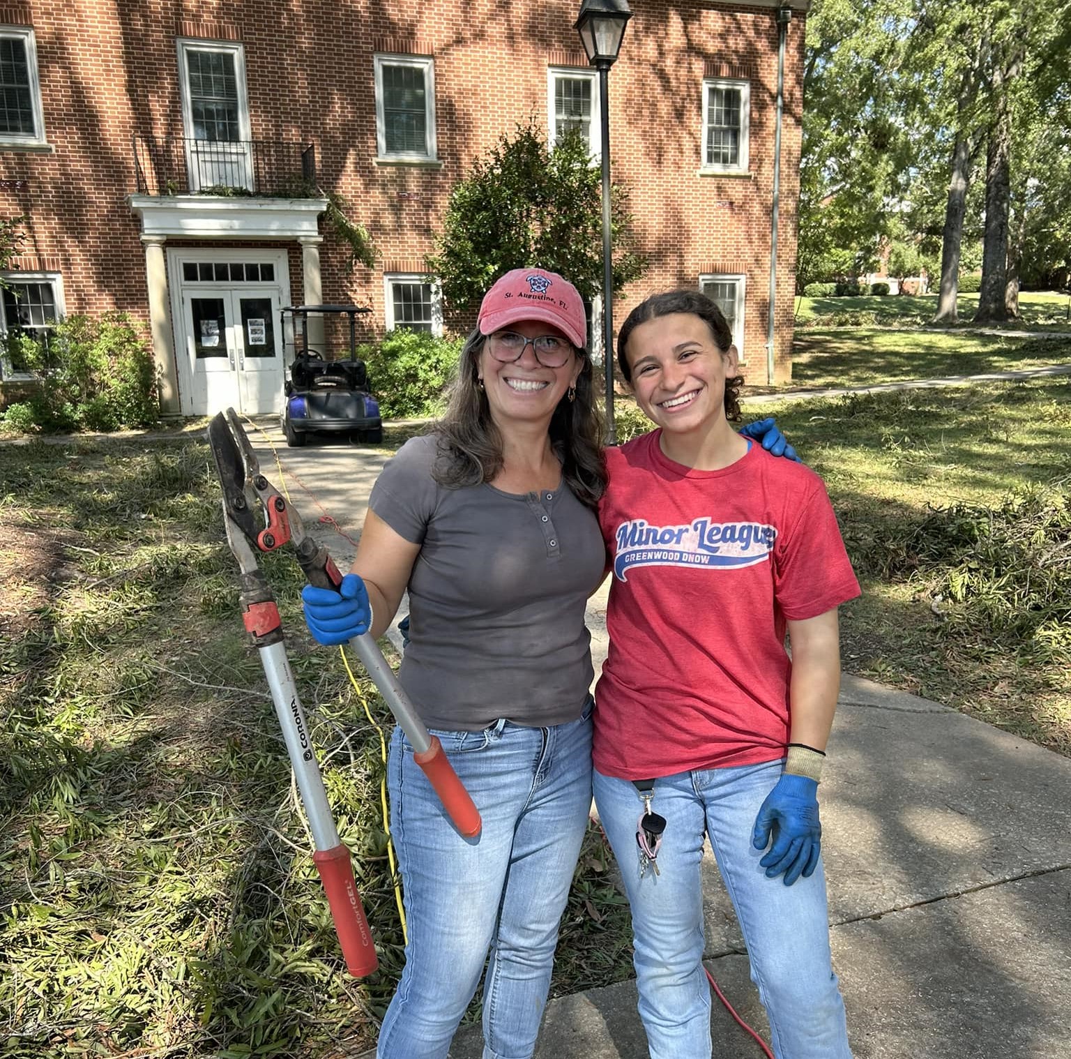 Dr. Brivio and her daughter help with cleanup