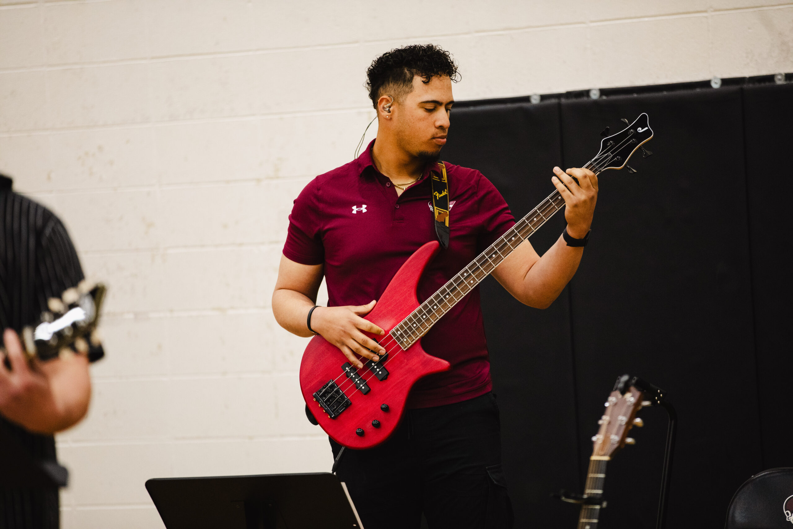 student playing guitar