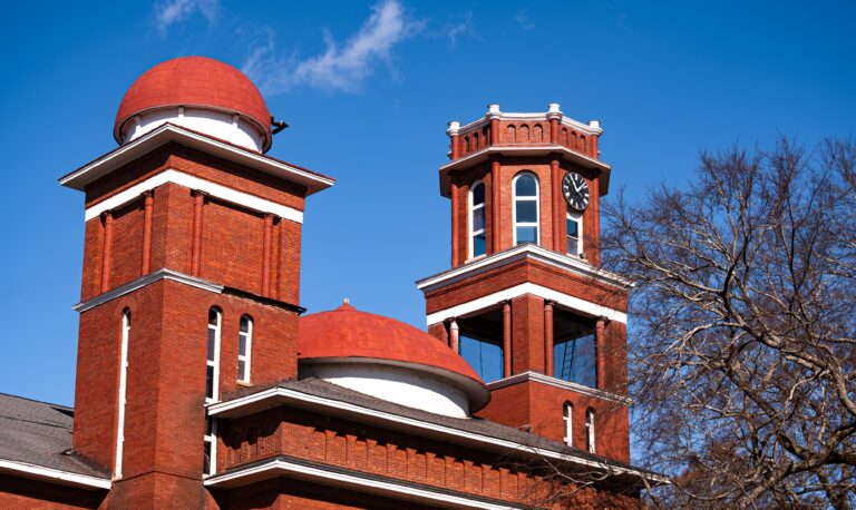 The Erskine Towers with a backdrop of blue sky