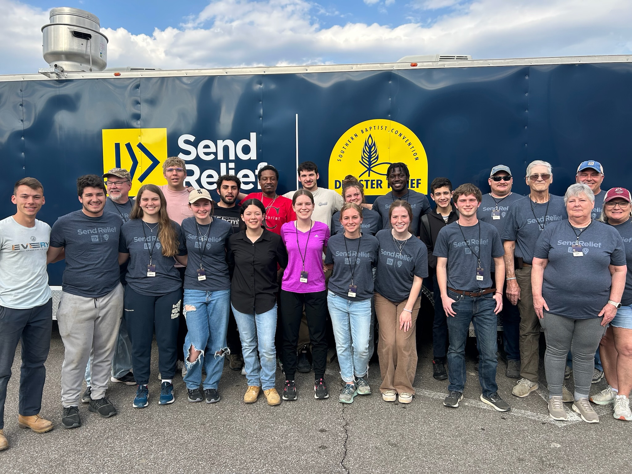 Erskine students pose alongside other Send Relief workers