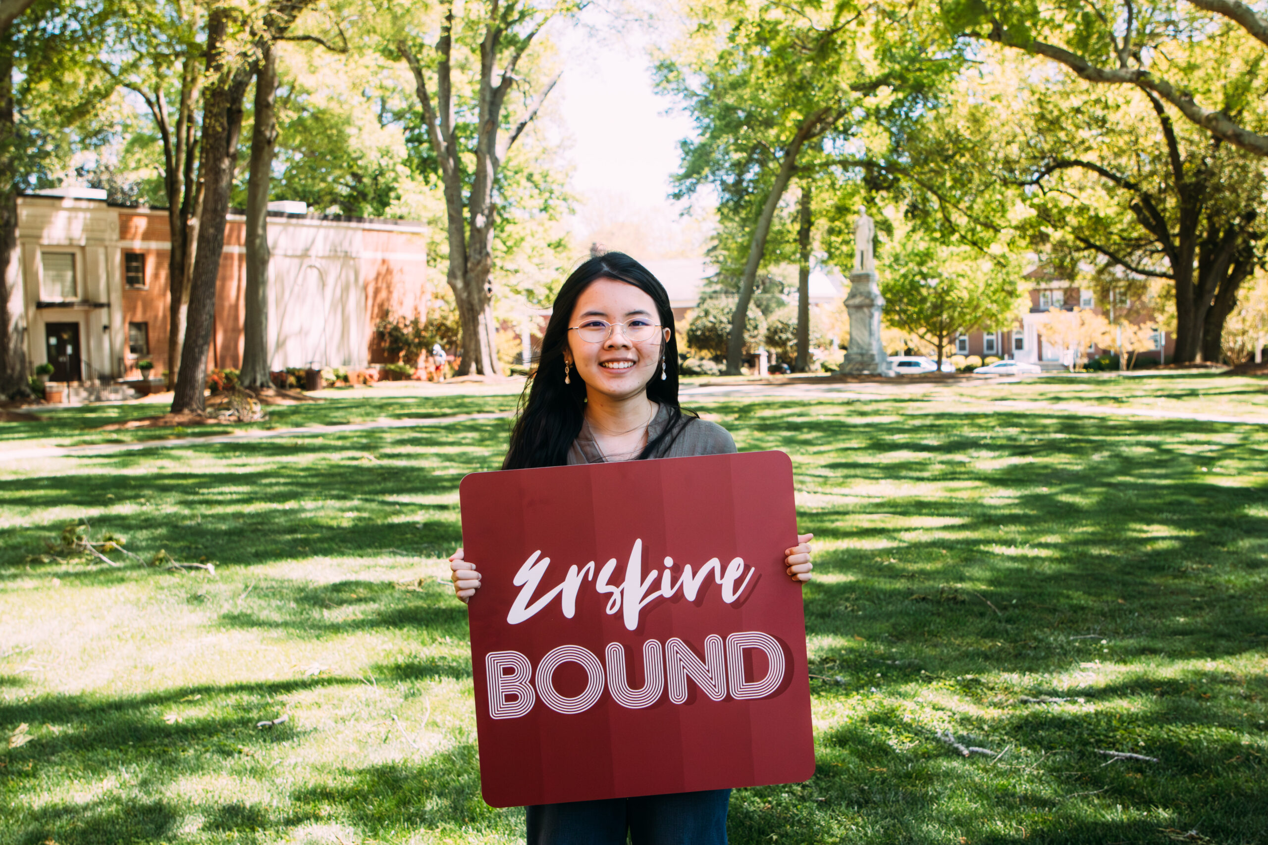Student holds "Erskine Bound" sign