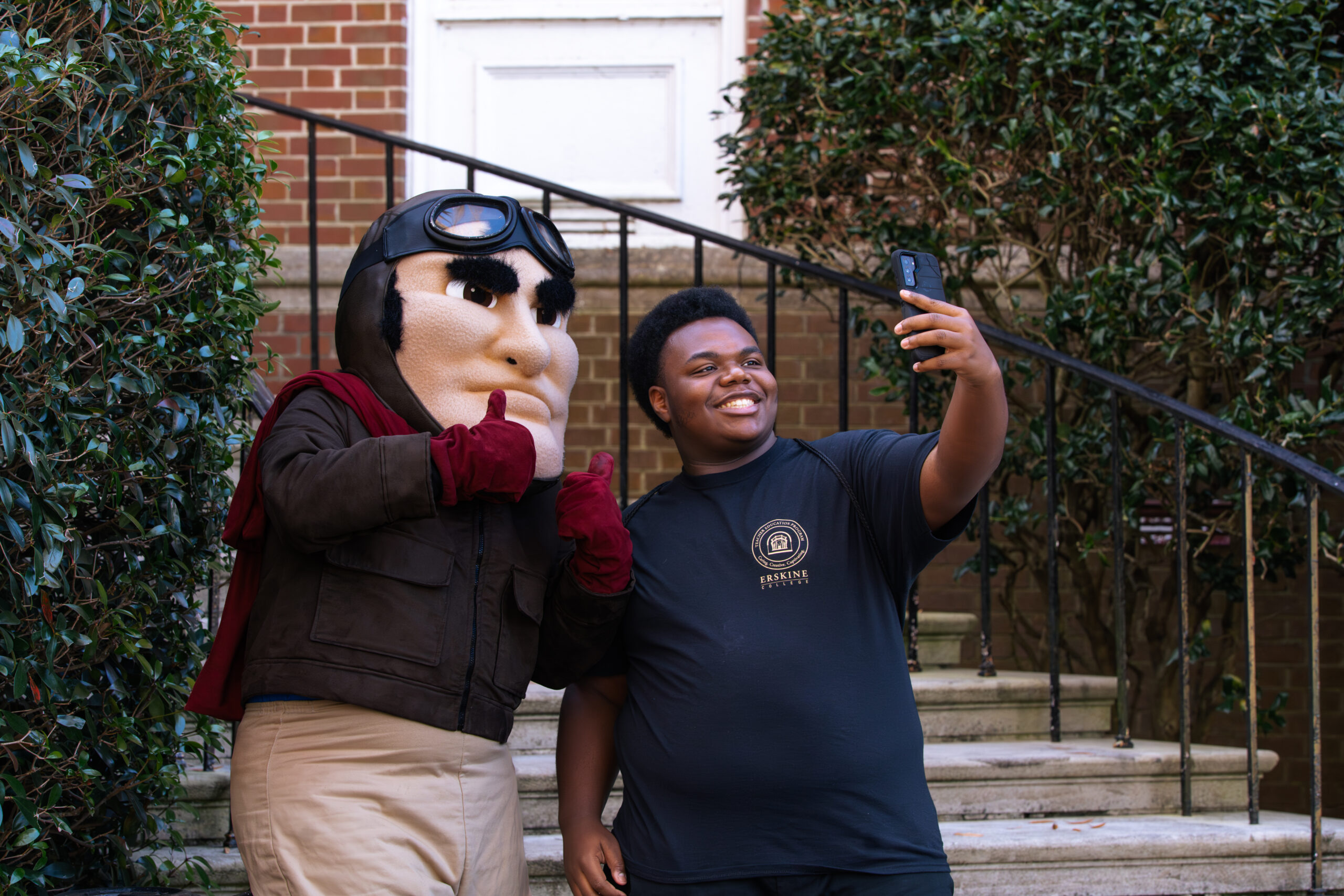 Student taking a selfie with Ace