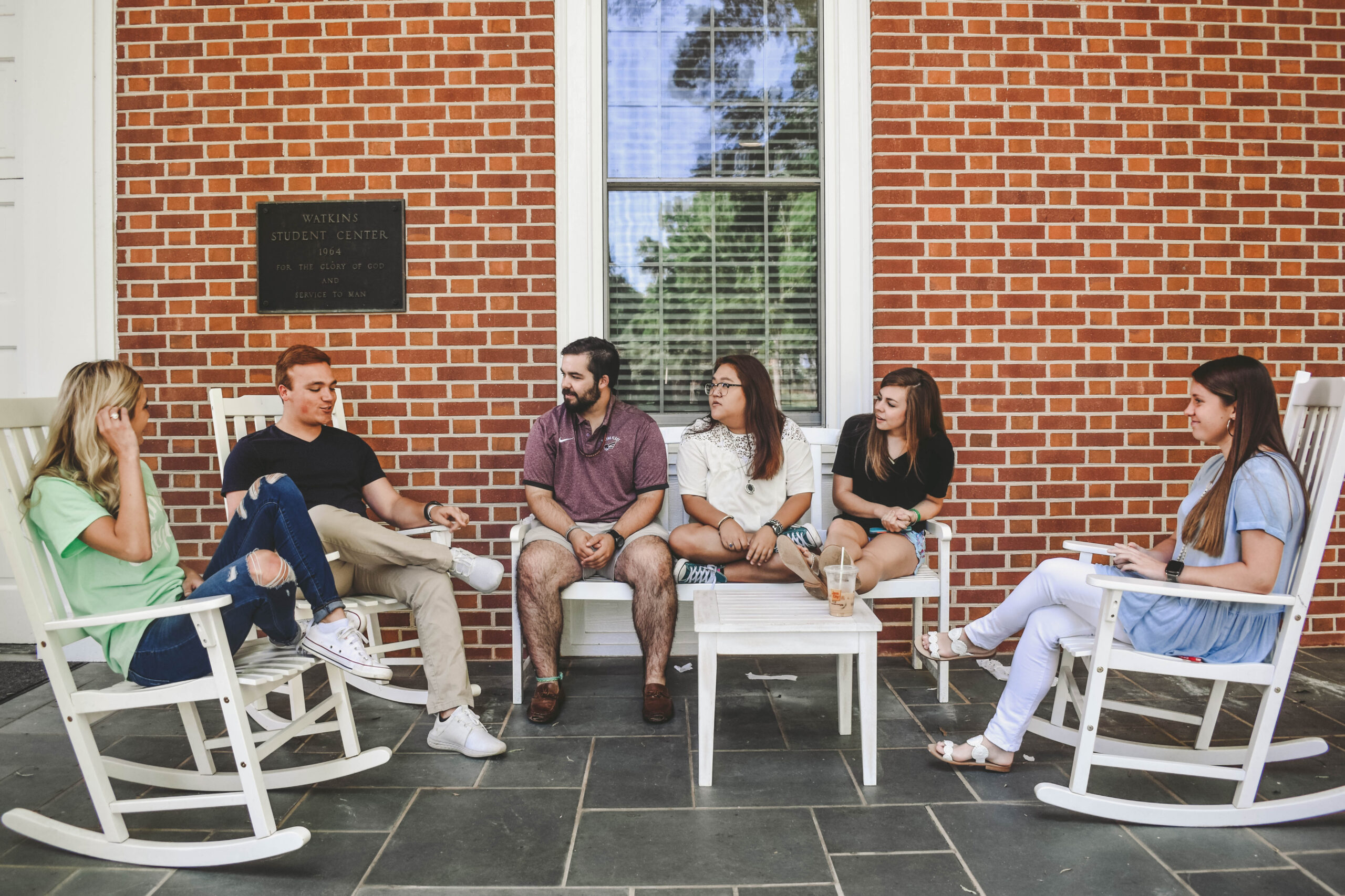 Students enjoy the Watkins Student Center porch