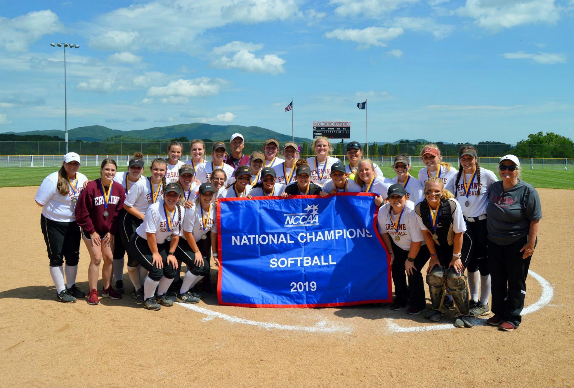 Head Coach Alleen Hawkins poses with her team after their 2019 NCCAA national championship