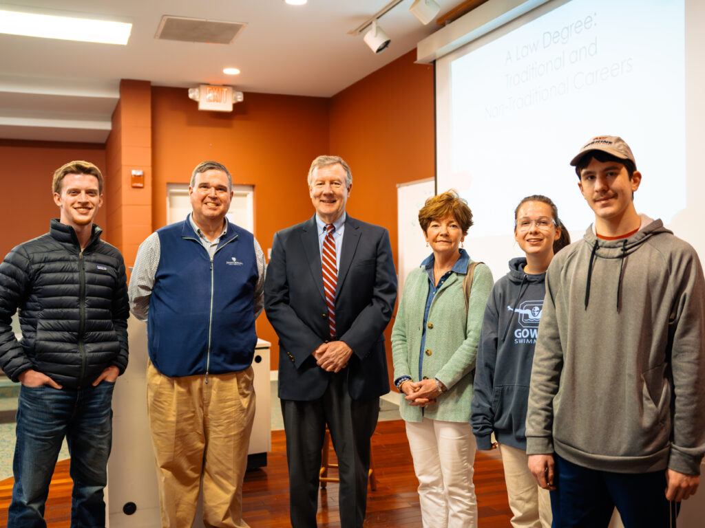 David Conner (third from left) poses with his wife, Erskine students, and Dr. Noel Brownlee