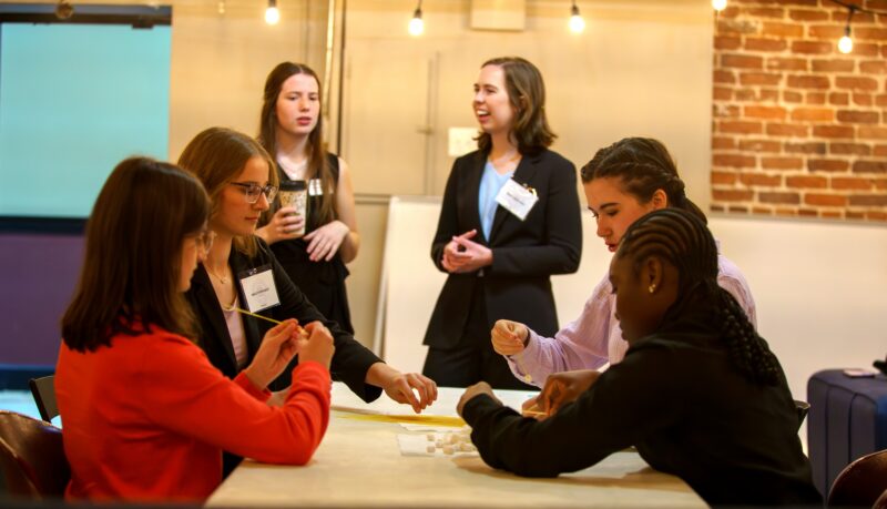 Presidential Scholars Including Jhoelle Osbourne engage in a group project.