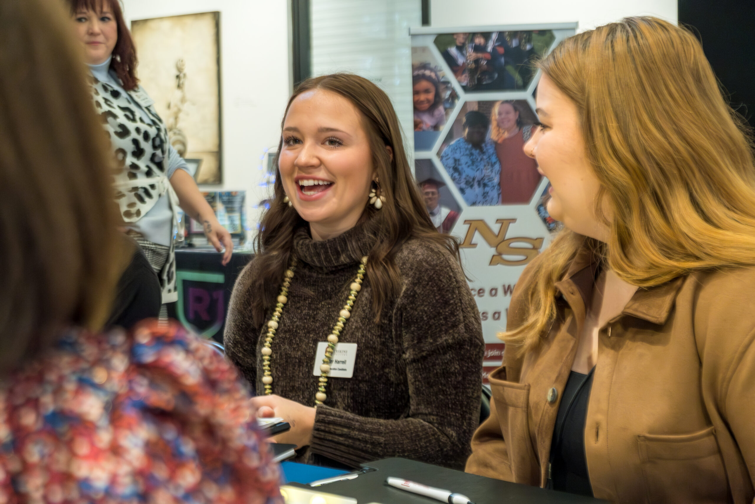Two education students talk with an interviewer