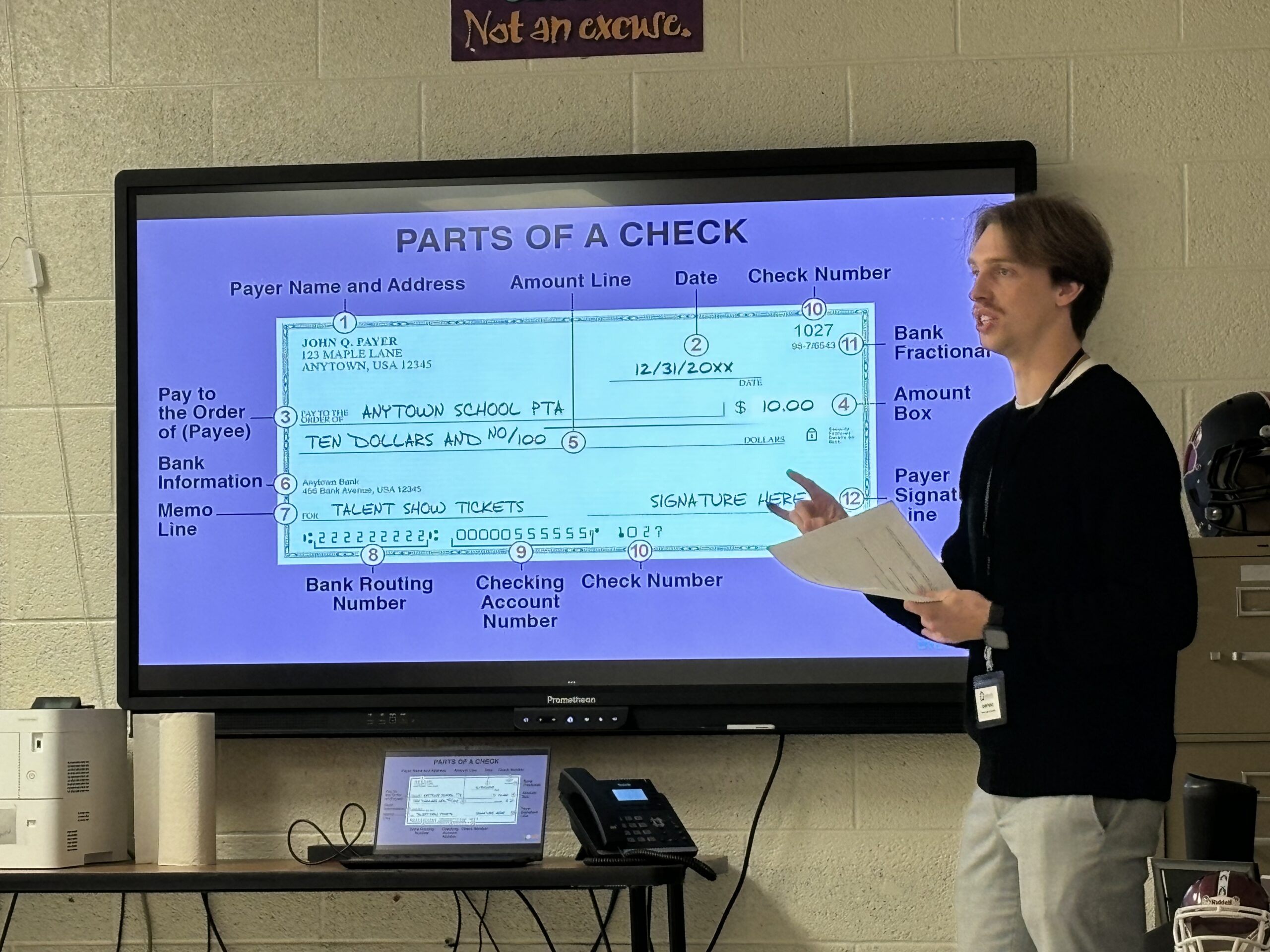 Erskine education student presents at a screen