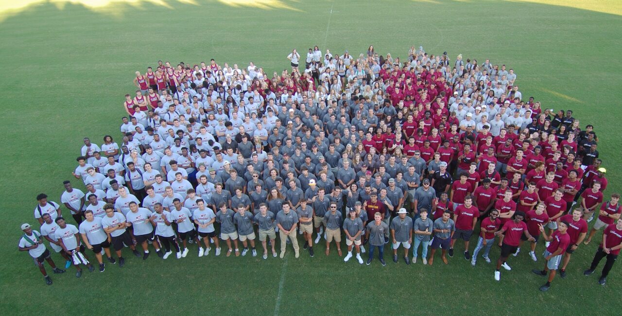 Overhead photo of a large group of Erskine student-athletes